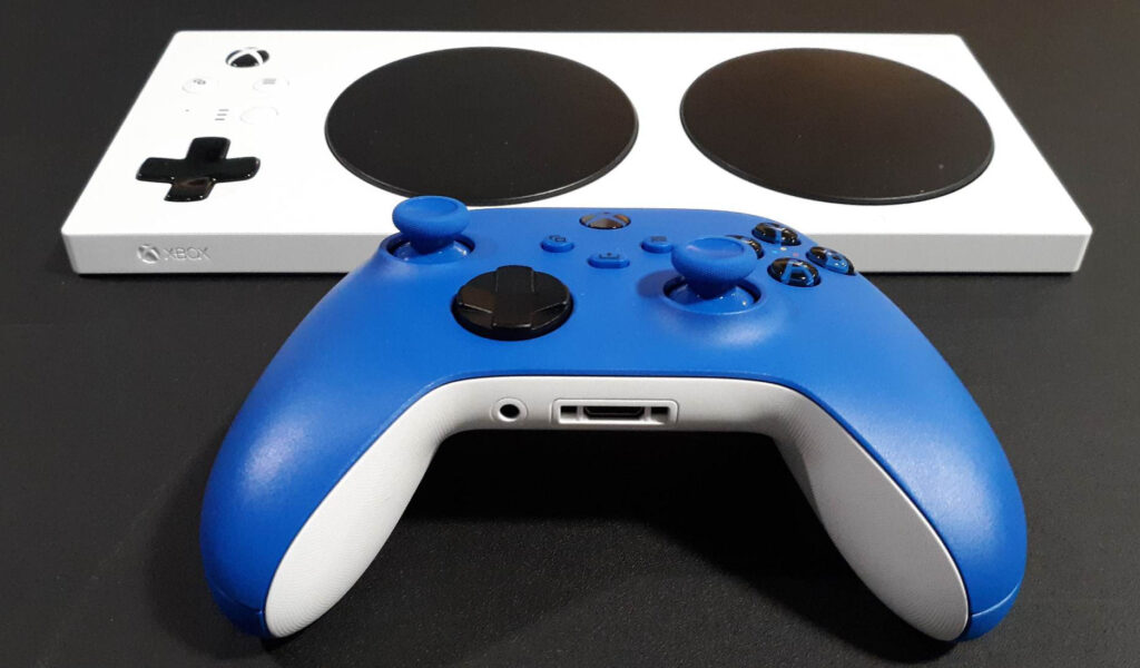 Seen is the Xbox Adaptive Controller and Xbox wireless controller as Short reflects on her experiences using them and Copilot mode. 